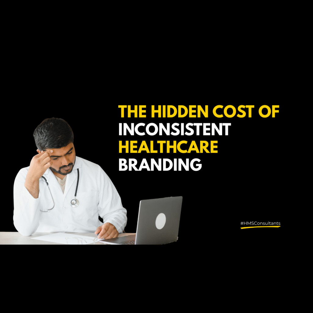 Doctor looking concerned while working on laptop, highlighting the hidden cost of inconsistent healthcare branding.